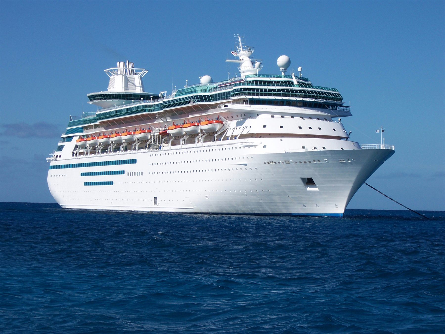 A modern cruise ship at sea on a repositioning voyage